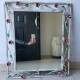 specchio-artigianale-con-foglie-e-rosette.jpg