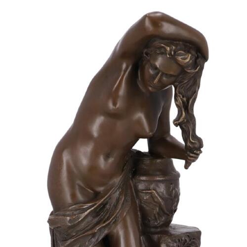 statua-bronzo-donna-e-toelettatura.jpg