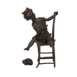 statua-in-bronzo-fanciullo-che-gioca-sulla-sedia.jpg